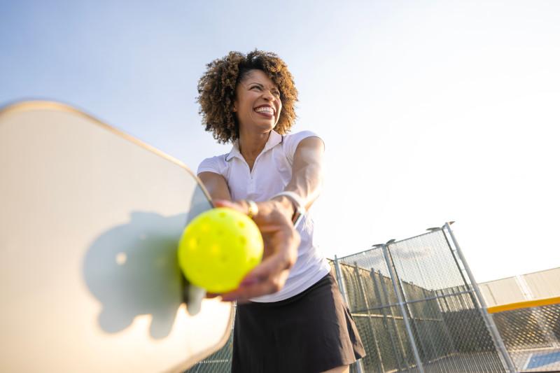Woman playing pickleball