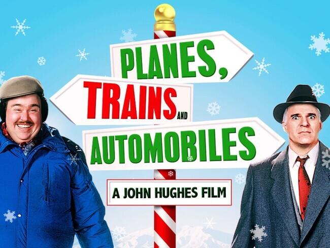 Planes, Trains and Automobiles A John Huges Film on a holiday themed directional sign with John Candy and Steve Martin on either side in winter attire